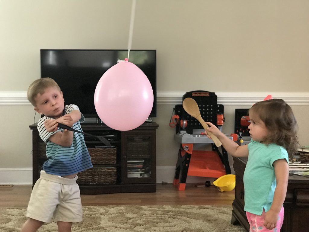 Kids-Hitting-Baloon