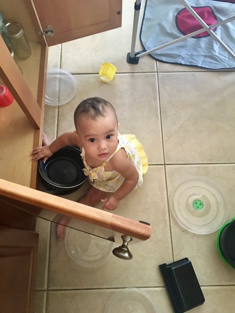 Baby-Playing-In-Tupperware